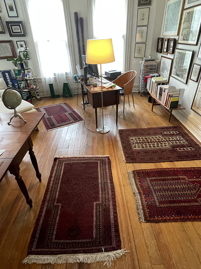 Vintage tribal Afghan prayer rugs in home office (author’s collection)