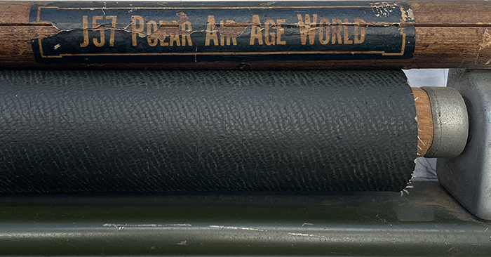 Indication of the title J57 Polar Air Age World chart labeled with a printed title strip on the bottom wooden dowel (turned oak) for easy reading when set in a box with other maps. In this photograph one sees the bottom wooden dowel which served as a spring roller (author’s collection)