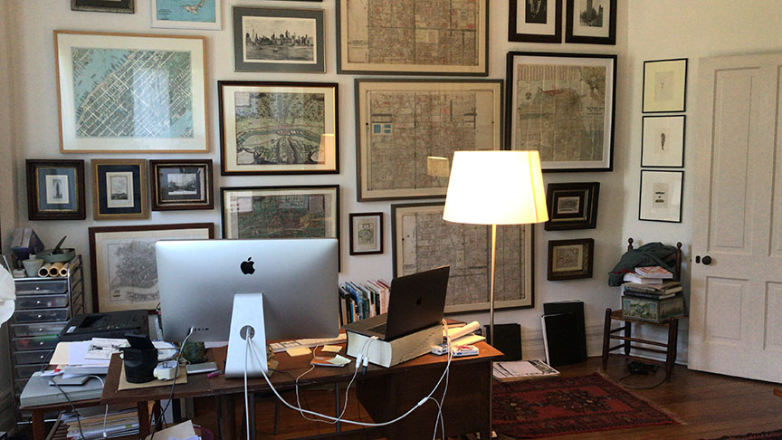 The author's office with a collection of vintage maps