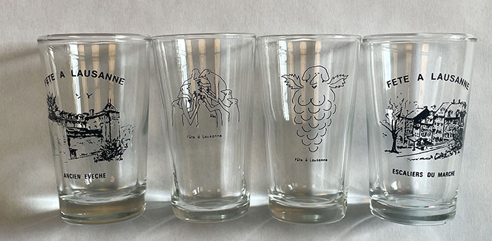 small white wine glasses featuring the Festival de la Cité (author’s collection)